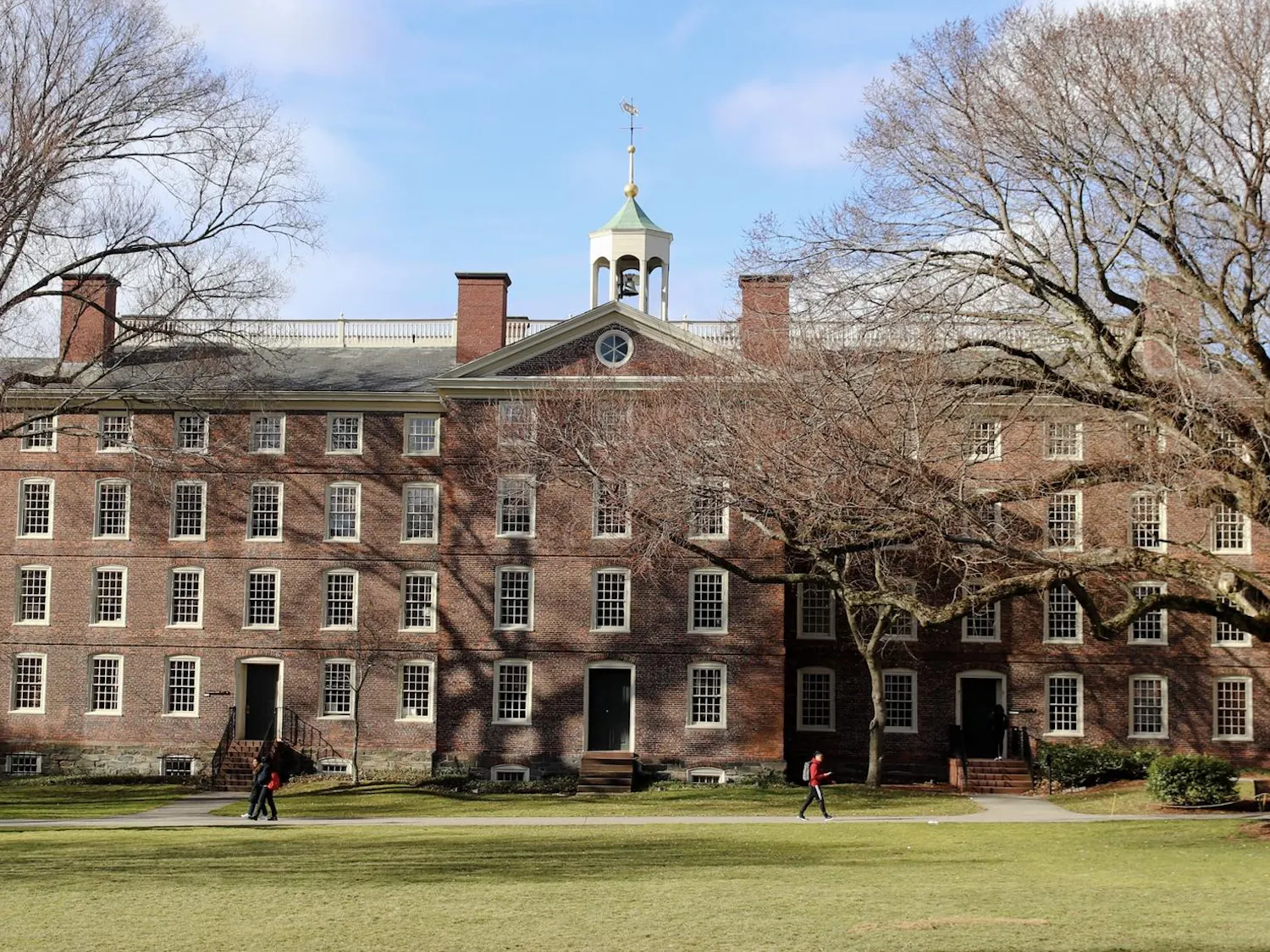 Photo of the front of University Hall on a clear sunny day.