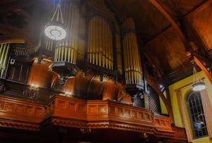 A photo taken from the first floor of Sayles Hall of the Hutchings-Votey pipe organ, which sits on the organ loft. 