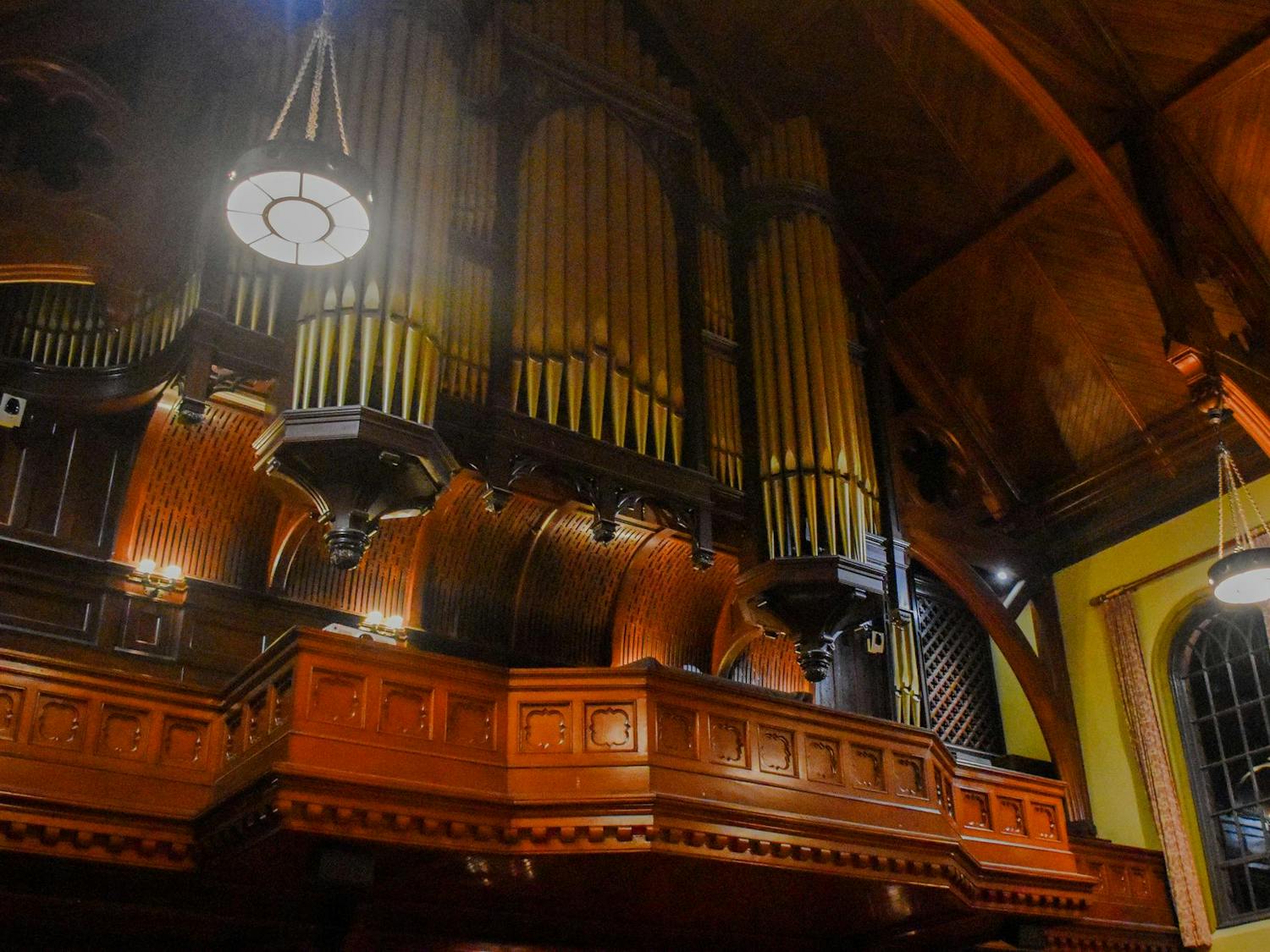A photo taken from the first floor of Sayles Hall of the Hutchings-Votey pipe organ, which sits on the organ loft.