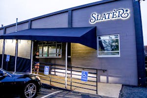 Photo of the entrance of the Thomas C. Slater Compassion Center on a cloudy day.