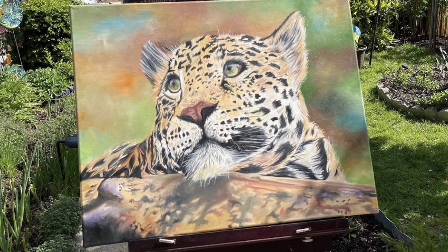 I'm Ivanna Dudych, a senior at Mast Community Charter School and this is my oil painting of leopard I created for my mother. I made this painting to experiment with different colors and brush stroke techniques to get the realistic feel of the painting.&nbsp;