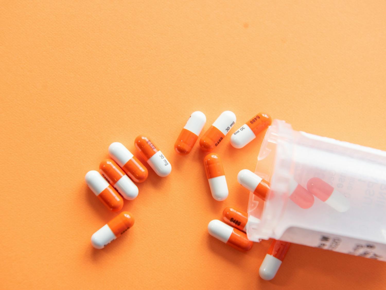 Prescription drugs with a pill bottle | Source: Unsplash Christina Victoria Craft