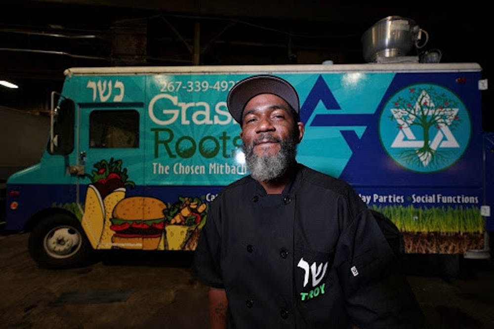 <p>Troy Harris in front of his Grassroots Kosher food truck </p><p>Credit YeahThatsKosher</p>