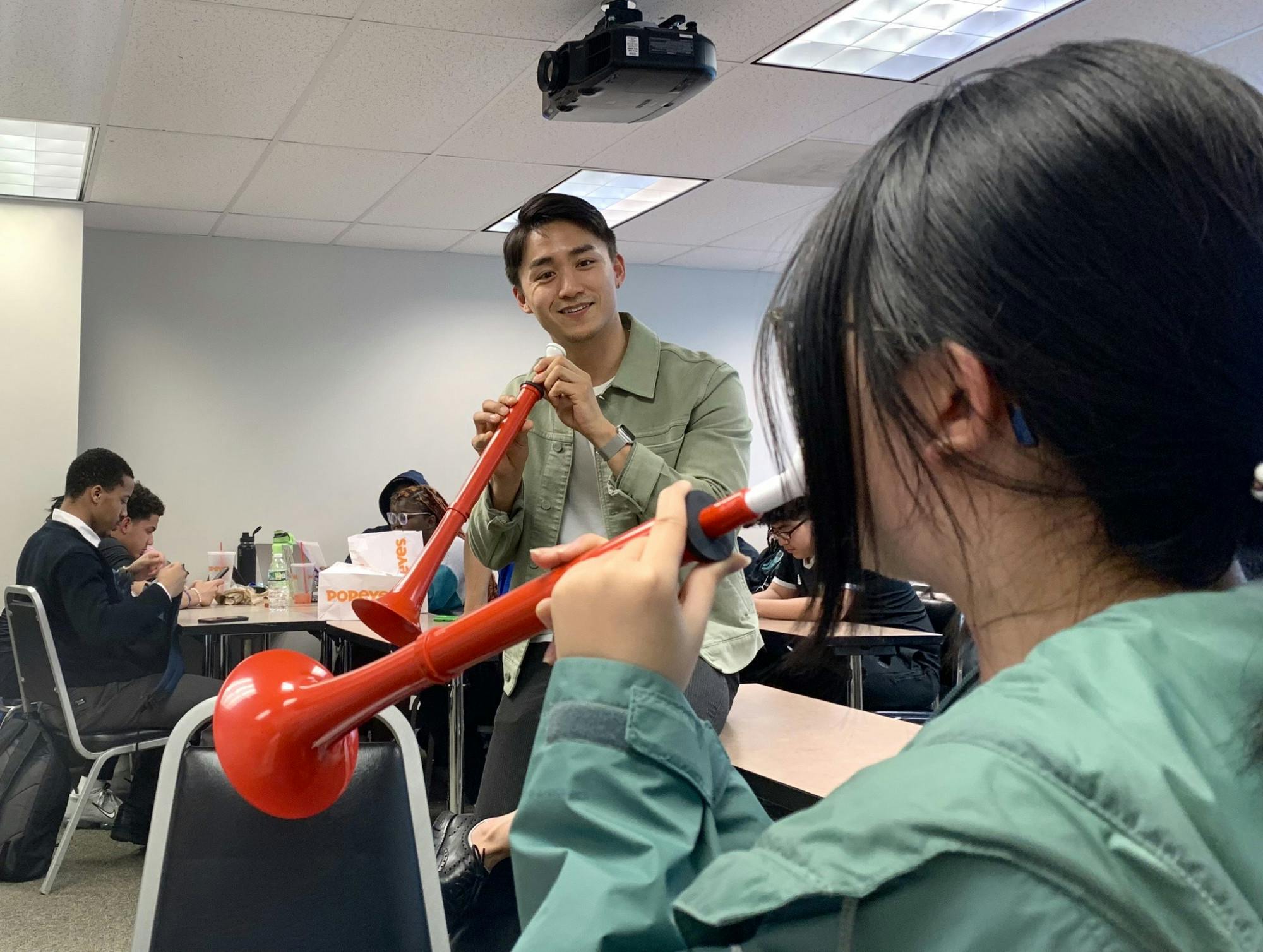 Nozomi Imamura playing the pBuzz with a Project 440 Student | Courtesy: Jennifer Tran