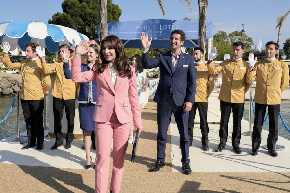 <p>Valentina (Sabrina Impacciatore) and the White Lotus staff greeting the guests as they arrive at the resort | Source: HBO Max﻿</p>