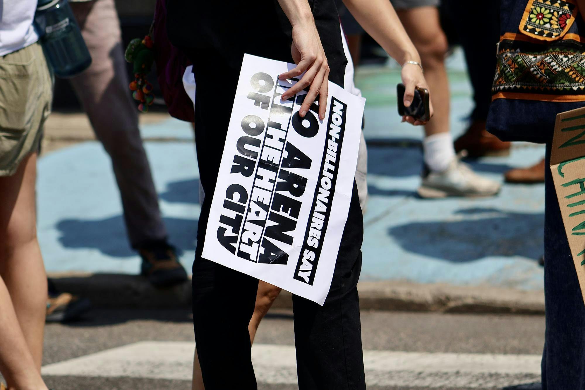 Protestors gathered in Chinatown before marching to City Hall on June 10, 2023, during the ‘No Arena Chinatown’ Protest