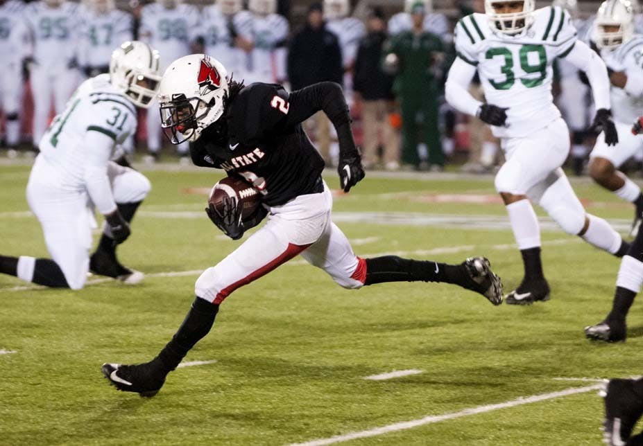 Senior wide receiver Jamill Smith runs through Ohio defensive players during a kick return. After the Ohio game, the Cardinals secured a spot at a bowl game in the postseason for the first time since 2008. DN FILE PHOTO BOBBY ELLIS