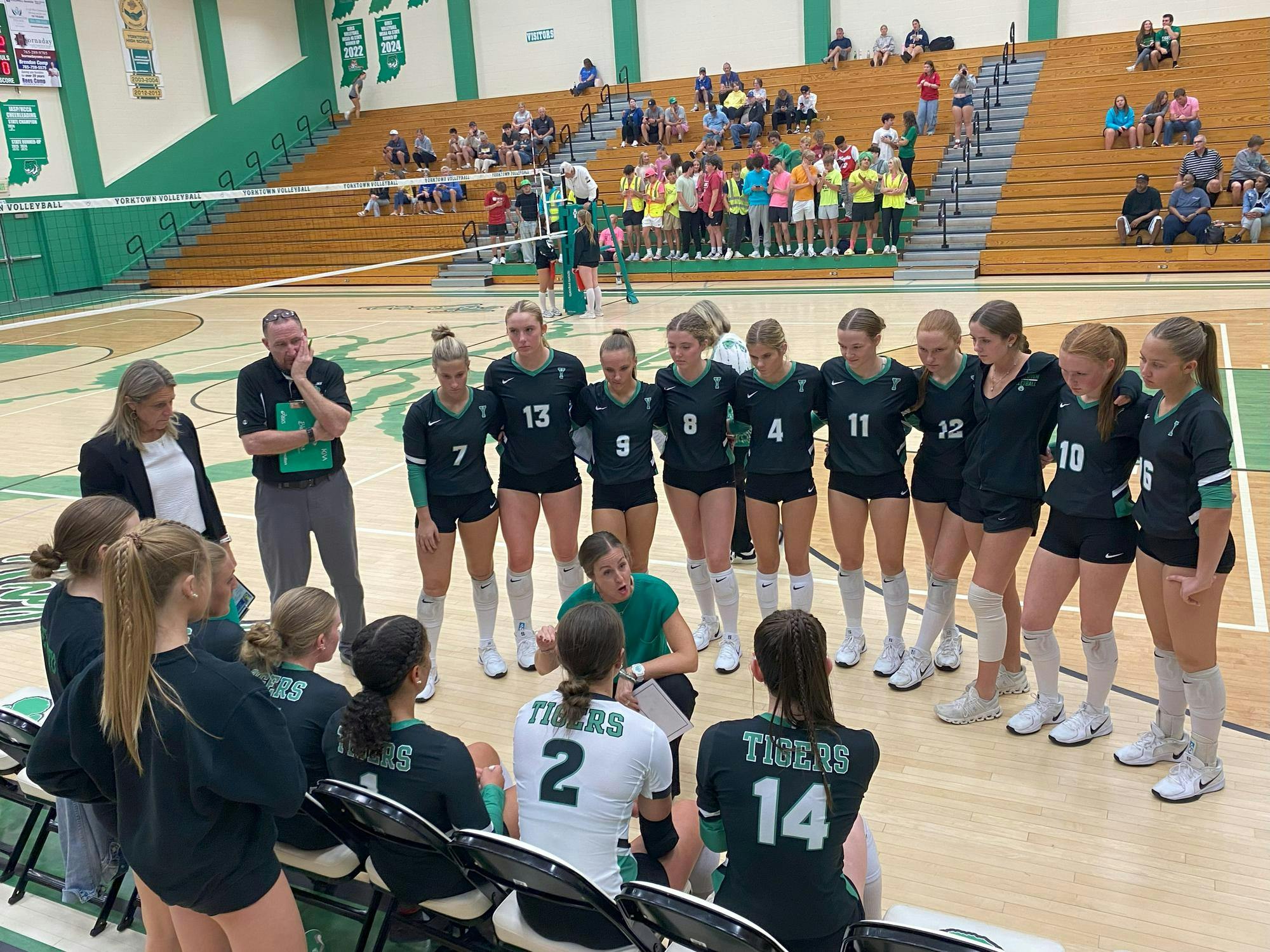 Yorktown huddles up to celebrate winning 3-0 against Green Central on Sept. 24 at home.