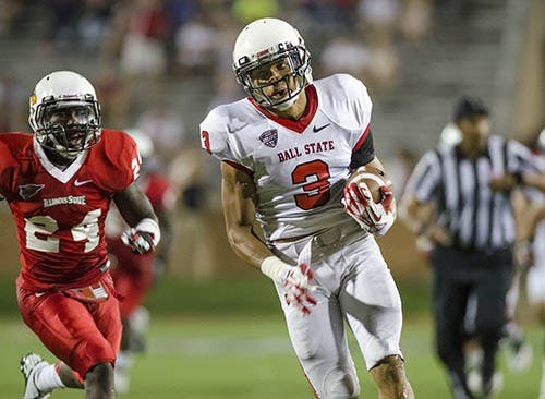 Junior wide receiver Willie Snead runs the ball for a touchdown in the second half of the game against Illinois State on Aug. 29, 2013. DN PHOTO COREY OHLENKAMP