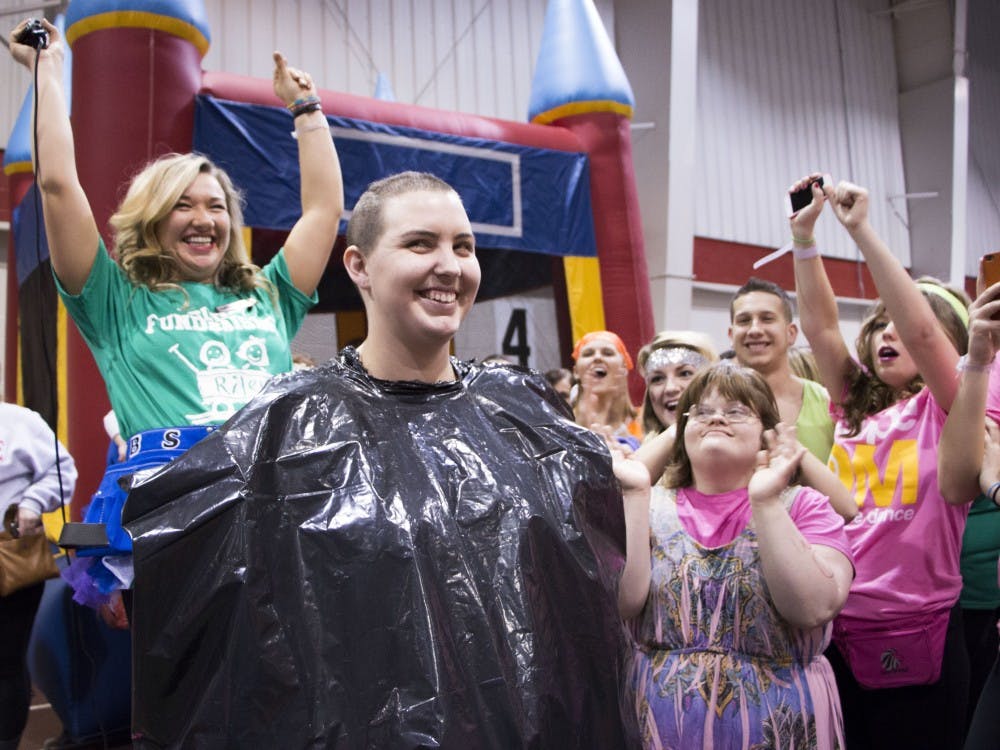 	Junior special education major Sam Hebe gets her head shaved at Ball State&#8217;s Dance Marathon on Feb. 22. DN PHOTO TAYLOR IRBY 