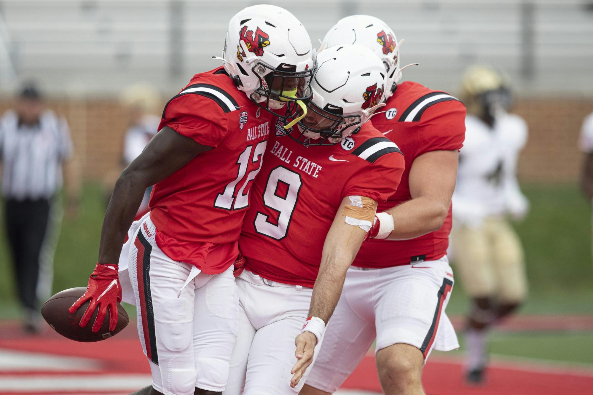 Cardinals junior wide receiver Jayshon Jackson celebrates a touchdown with redshirt fifth-year quarterback Drew Plitt Oct. 2, 2021, at Scheumann Stadium. The Cardinals beat the Black Knights 28-16. Jacob Musselman, DN