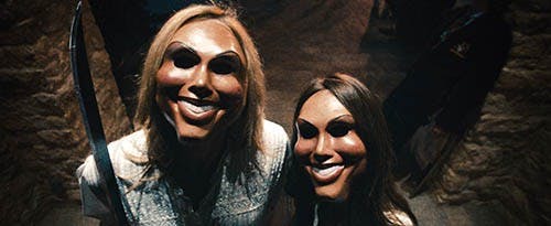 Psychotic celebrants prepare to attack the Sandin family in “The Purge.” MCT PHOTO