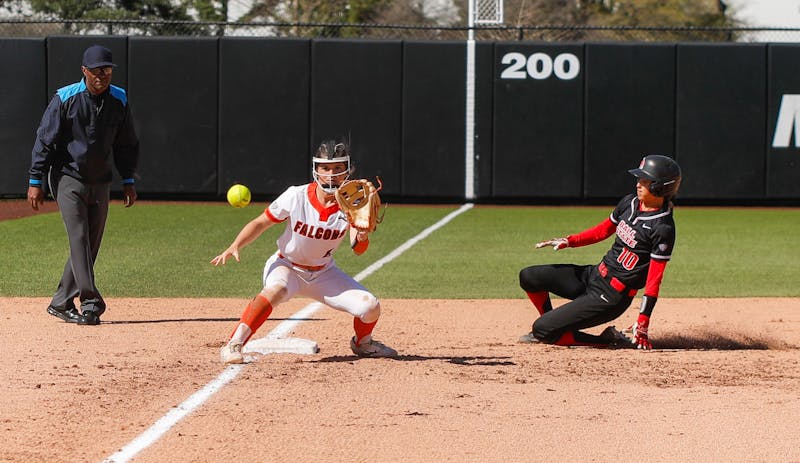 Graduate student utility Jazmyne Armendari slides into third base just in time against Bowling Green April 13 at First Merchants Ballpark Complex. Andrew Berger, DN