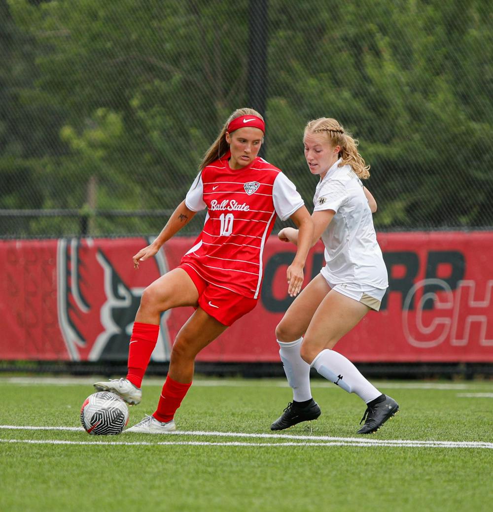 Junior midfielder Addie Chester dribbles at the top of the box against Purdue Ft. Wayne University Aug 15 at Briner Sports Complex. Chester had one assist in the game. Andrew Berger, Ball State Daily News