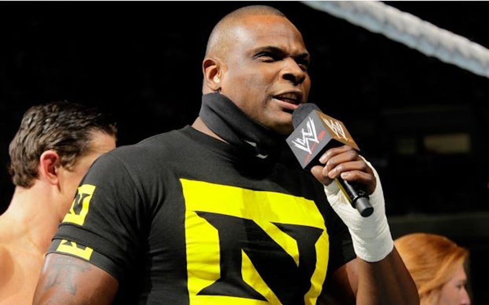<p>Tyrone Evans addresses the WWE Universe as his alter ego, Michael Tarver, as part of the group "The Nexus" at a WWE Event. Tyrone Evans, Photo Provided&nbsp;</p>