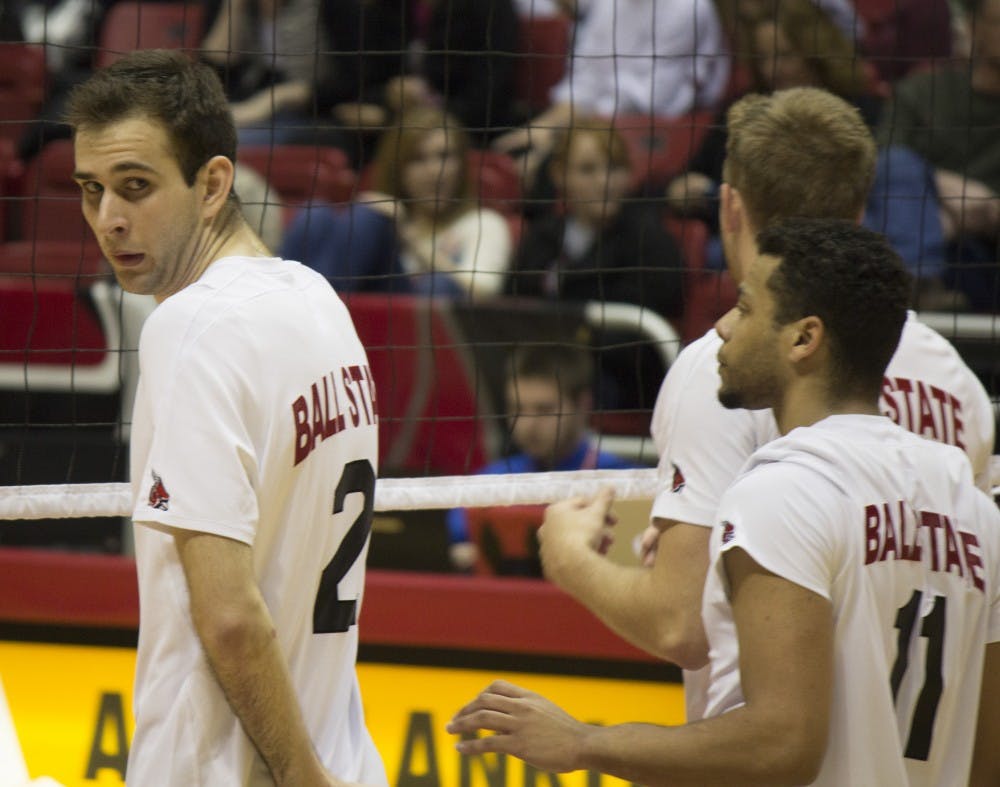 Senior middle attacker Matt Leske and senior outside attacker Larry Wrather get ready for a serve from Loyola during the match on Feb. 20 at Worthen Arena. DN PHOTO ALISON CARROLL