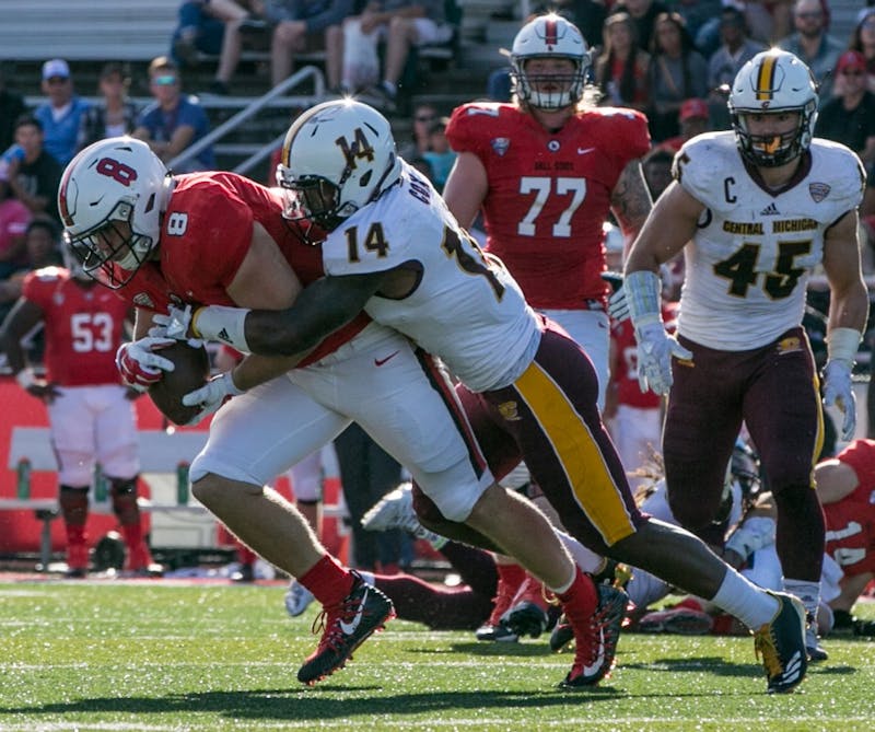 Redshirt junior fullback Cody Rudy attempts to run the ball during the homecoming game against Central Michigan Oct. 21, 2017, in Scheumann Stadium. The Cardinals fell, 56-9. Kaiti Sullivan, DN File