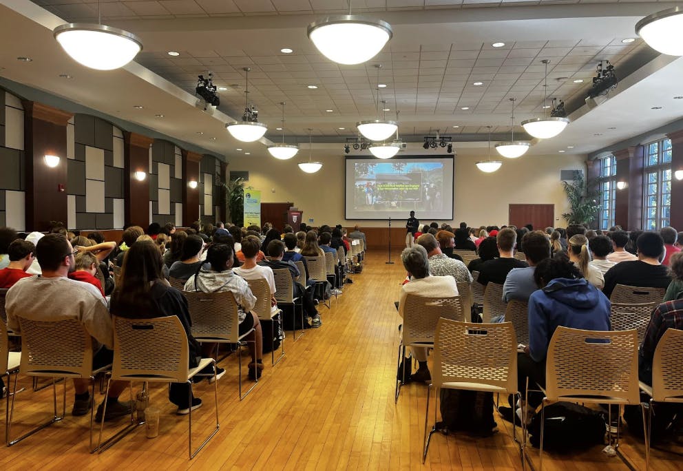Mugerwa speaks to the audience about the dangers the African Golden Cat faces.

Arlene Thompson, NewsLink Indiana

