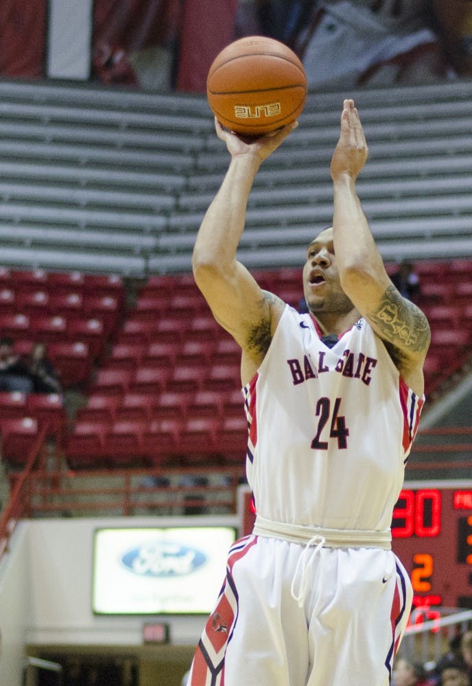 Redshirt junior guard Jeremiah Davis attempts to shot from behind the arc during the game against Bowling Green on Feb. 14 at Worthen Arena. DN PHOTO BREANNA DAUGHERTY