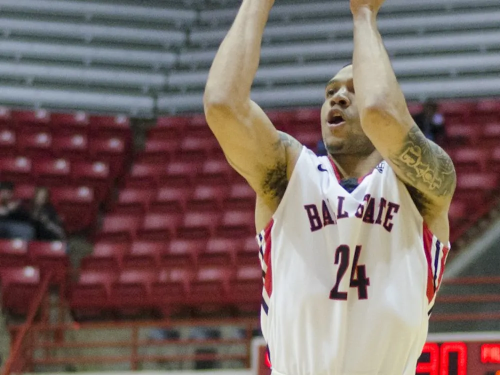 Redshirt junior guard Jeremiah Davis attempts to shot from behind the arc during the game against Bowling Green on Feb. 14 at Worthen Arena. DN PHOTO BREANNA DAUGHERTY