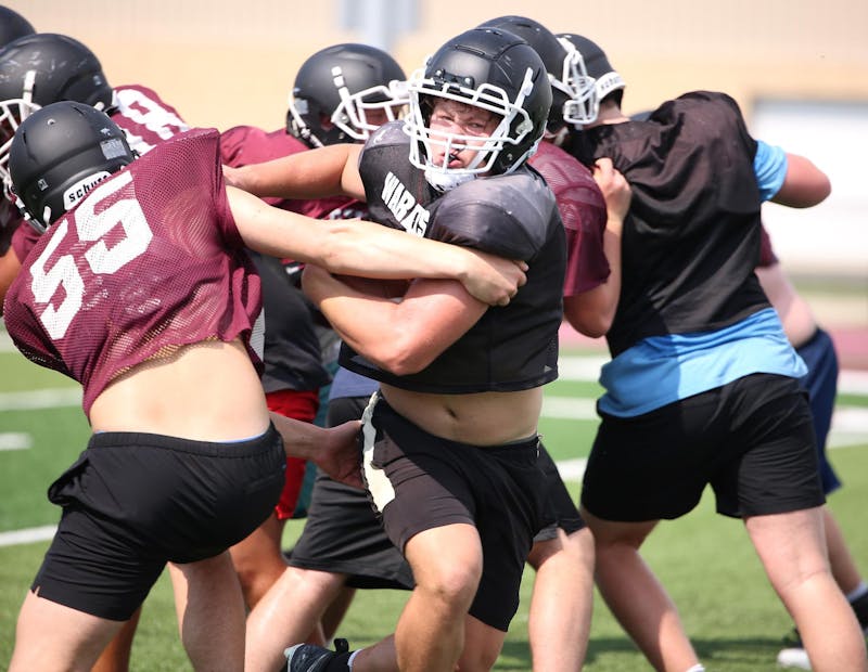 Wes-Del junior Brock Nauman breaks a tackle July 31 during a practice at Wes-Del Junior/Senior High School. Nauman had 573 rushing yards and six touchdowns in 2023. Zach Carter, DN.