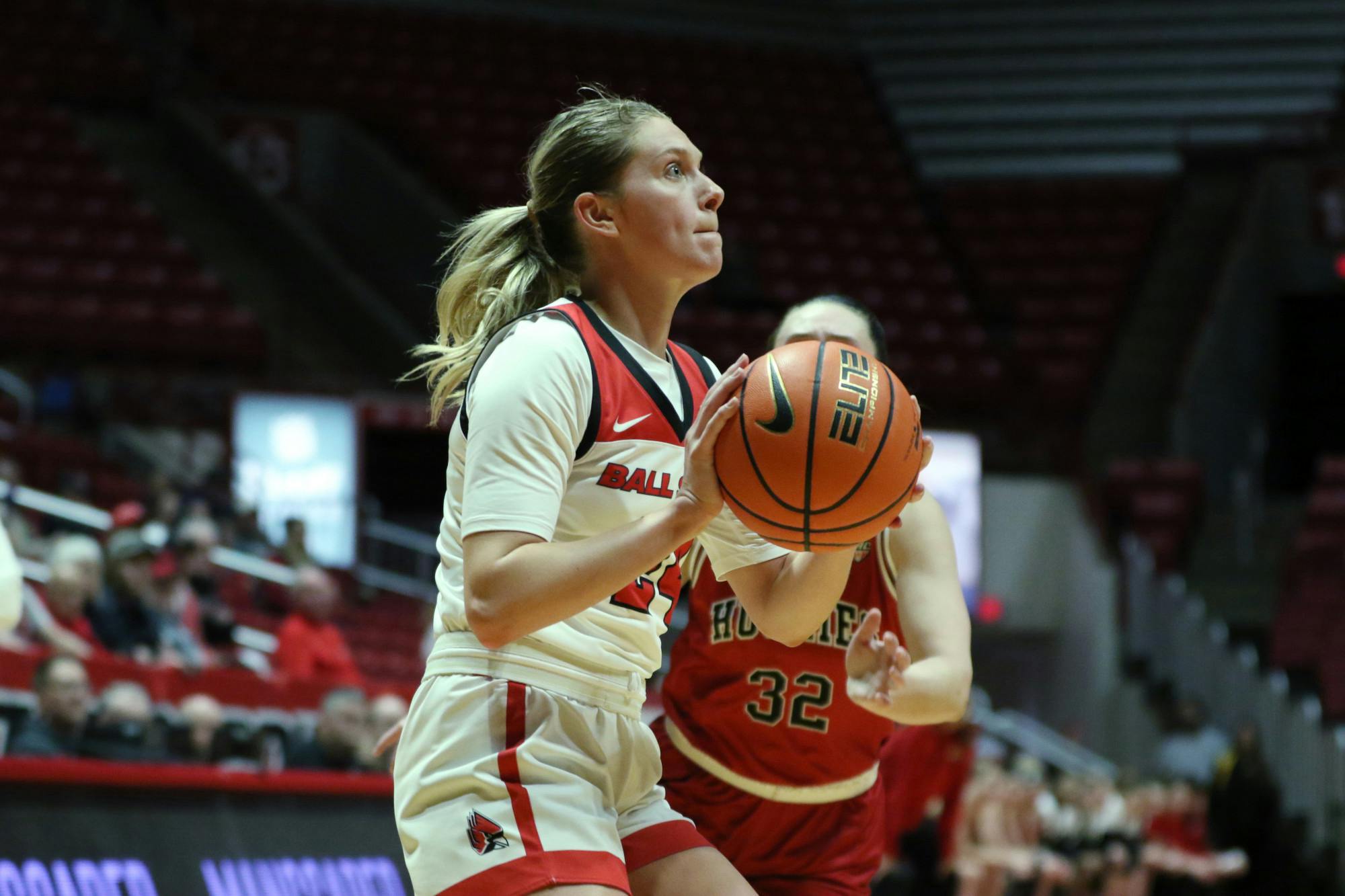 Sophomore Madelyn Bischoff goes for a jump shot in a game against Northern Illinois Feb. 1 at Worthen Arena. Biscoff finished with 15 points for the Cardinals. Brayden Goins, DN