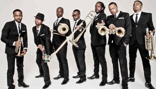 The Hypnotic Brass Ensemble, a group of eight brothers from Chicago's south side, will perform in Pruis Hall on Oct. 27. The group&nbsp;mixes jazz and hip hop with trumpets, trombones and a baritone.&nbsp;Hypnotic Brass Ensemble // Photo Courtesy