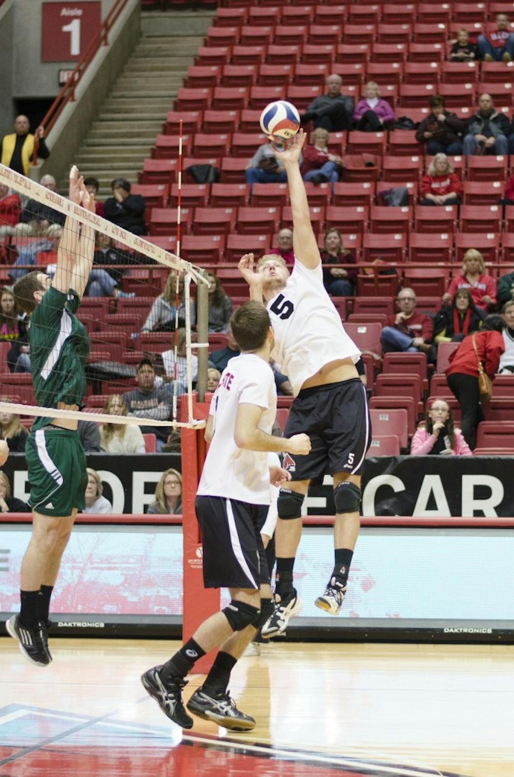 Senior setter Graham McIlvaine hits the ball over the net in the first set against Mount Olive on March 1 at Worthen Arena. DN PHOTO BREANNA DAUGHERTY 