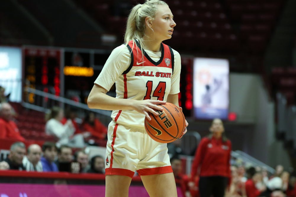 Sophomore Marie Kiefer kills the clock in a game against Northern Illinois Feb. 1 at Worthen Arena. Kiefer led in team in rebounds with ten.  Brayden Goins, DN