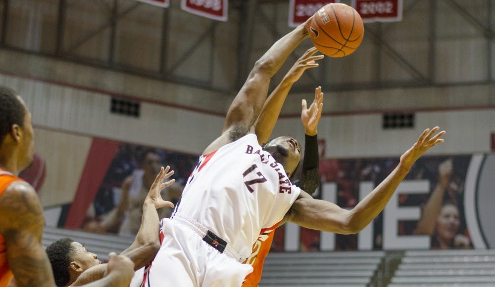 Junior forward Bo Calhoun attempts to get a rebound during the game against Bowling Green on Feb. 14 at Worthen Arena. DN PHOTO BREANNA DAUGHERTY