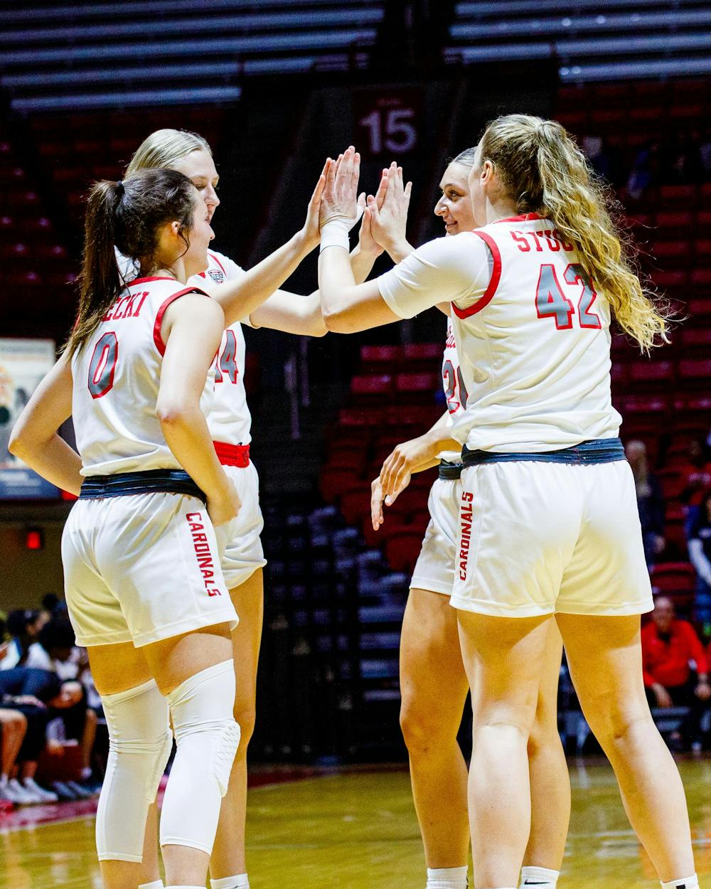 Graduate Forward Elise Stuck and Senior Forward Marie Kiefer hand clap before the game against IU Indy Nov. 8 at Worthen Arena. The game started 30 minutes following the men's basketball game-opener. Kate Tilbury, DN