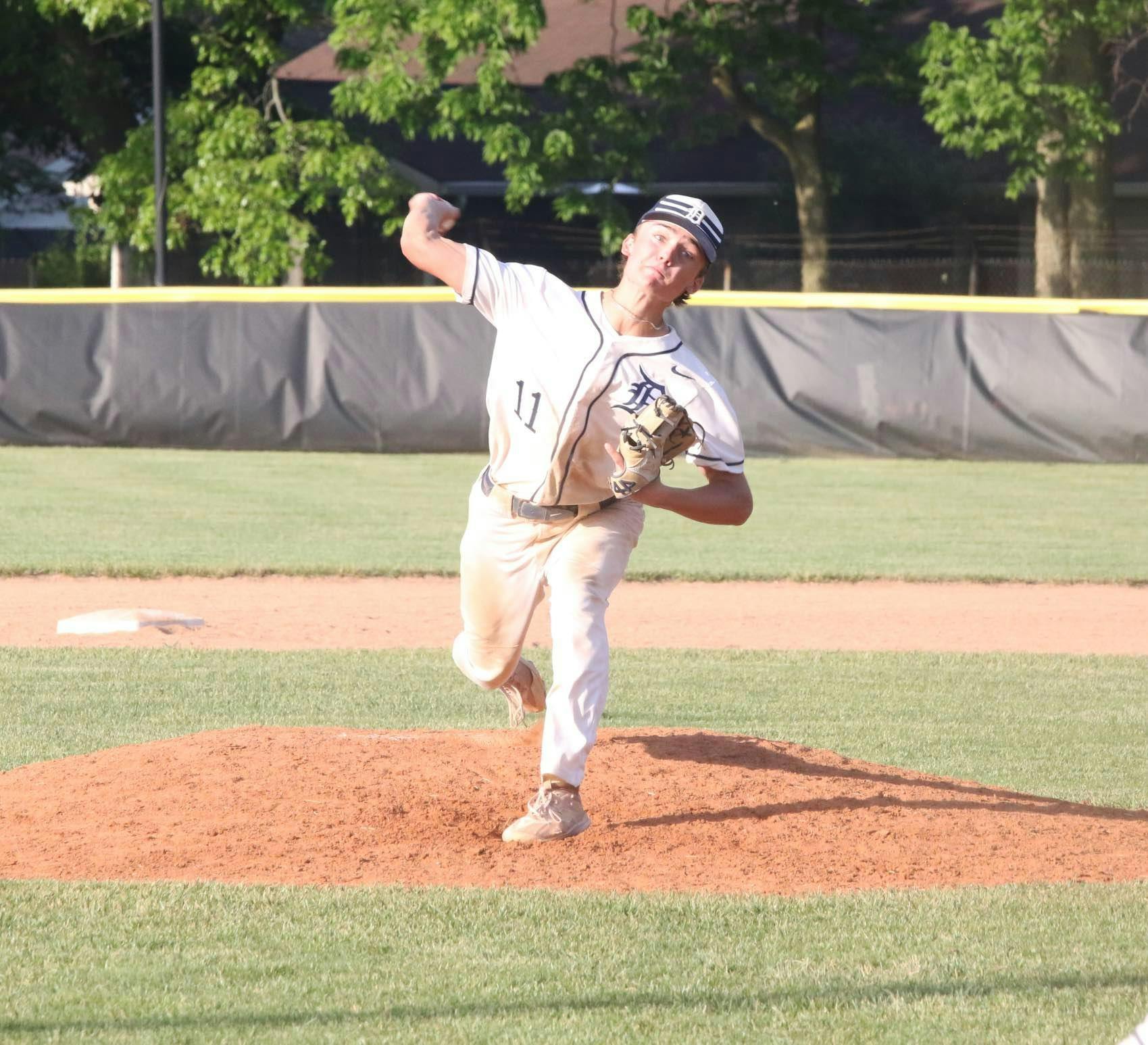 Delta sophomore Zane Cline prepares to throw a pitch May 29 during the Sectional #24 championship game at Yorktown High School. Zach Carter, DN. 