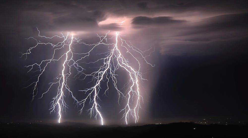 Step leaders branch out from cloud to ground lightning strikes, Sunday, Aug. 16, 2020, as an early morning storm rips across the Santa Rosa plain near Healdsburg, Calif. (Kent Porter/The Press Democrat via AP)