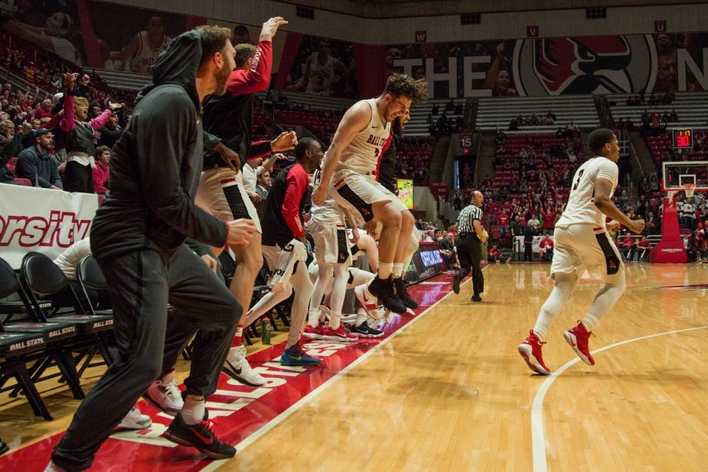 <p>Ball State's bench, along with the rest of Worthen Arena, goes wild after Freshan Tyler Leddy scored his first points of the game against Toledo, OH in Worthen Arena on Feb. 17. <strong>Eric Pritchett, DN</strong></p>