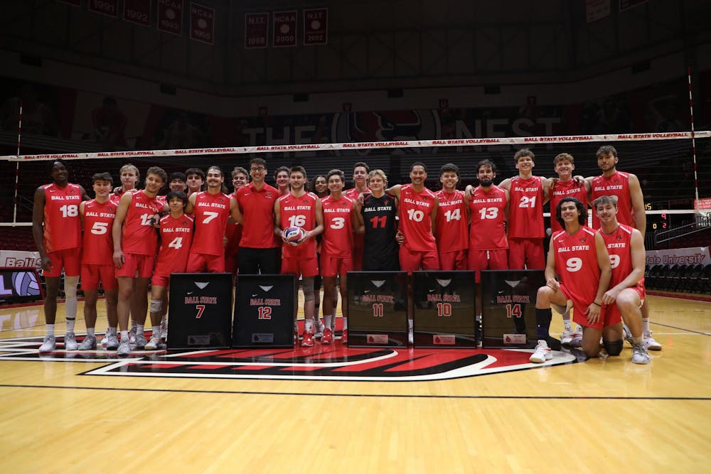 <p>Ball State men's volleyball pose for a photo after their game against McKendree April 6 at Worthen Arena. The Cardinals won 3-2 against the Bobcats. Mya Cataline, DN</p>