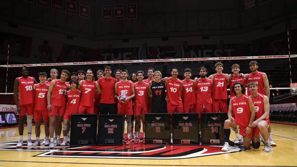 Ball State men's volleyball pose for a photo after their game against McKendree April 6 at Worthen Arena. The Cardinals won 3-2 against the Bobcats. Mya Cataline, DN