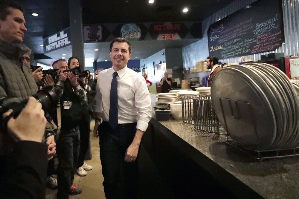 <p>Democratic presidential candidate former South Bend, Ind., Mayor Pete Buttigieg arrives at Community Oven Pizza for a campaign event, Tuesday, Feb. 4, 2020, in Hampton, N.H. <strong>(AP Photo/Elise Amendola)</strong></p>