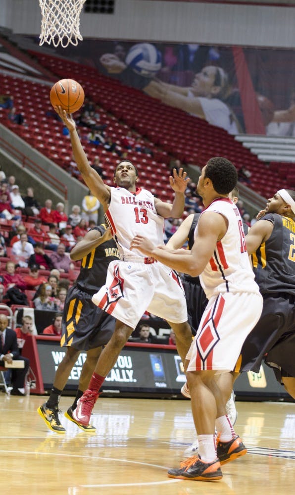 Freshman guard Mark Alstork goes for a shot against Toledo Feb. 8 at Worthen Arena. DN PHOTO BREANNA DAUGHERTY 