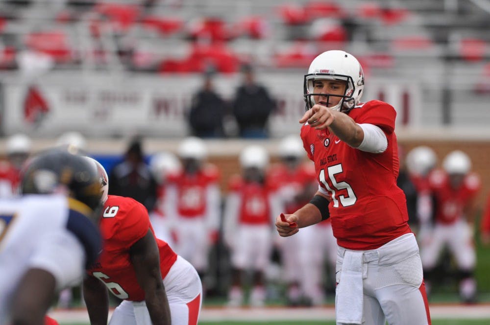 Quarterback Riley Neal gives a direction during the game against Toledo on Oct. 3 at Scheumann Stadium. DN PHOTO JASON CONERLY