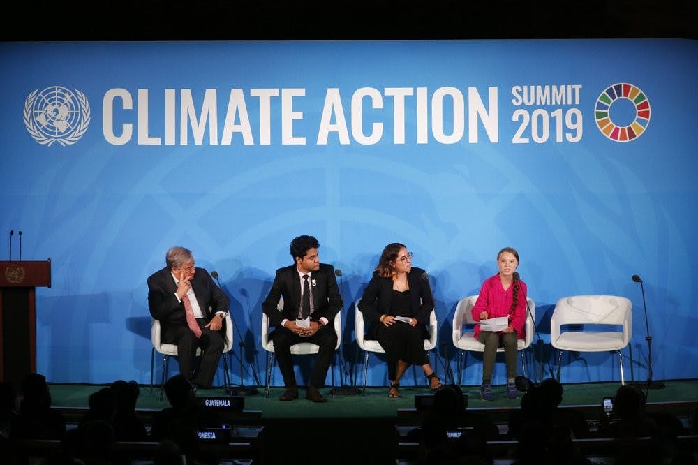 <p>United Nations Secretary-General Antonio Guterres, far left, and young environmental activists look on as Greta Thunberg, of Sweden, far right, addresses the Climate Action Summit in the United Nations General Assembly, at U.N. headquarters, Monday, Sept. 23, 2019. <strong>(AP Photo/Jason DeCrow)</strong></p>