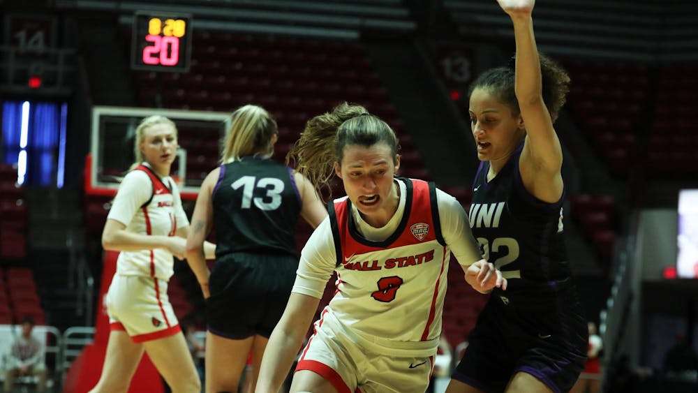 Junior Ally Becki dribbles the ball towards the net against Northern Iowa Nov. 18 at Worthen Arena. Mya Cataline, DN