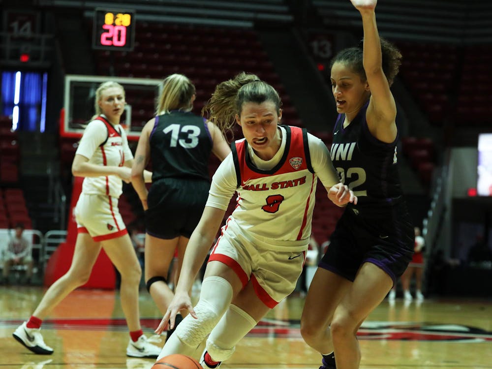 Junior Ally Becki dribbles the ball towards the net against Northern Iowa Nov. 18 at Worthen Arena. Mya Cataline, DN