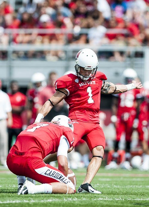 Senior kicker Scott Secor attempts a field goal against Army on Sep. 7. DN PHOTO JONATHAN MIKSANEK