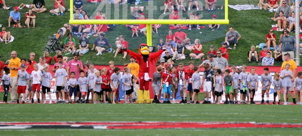 Young Ball State fans participate in the Kiddie 100 at halftime of the Cardinals’ game against Tennessee Tech Sept. 16, 2017, at Scheumann Stadium. Ball State was celebrating Famliy Weekend. Paige Grider, DN
