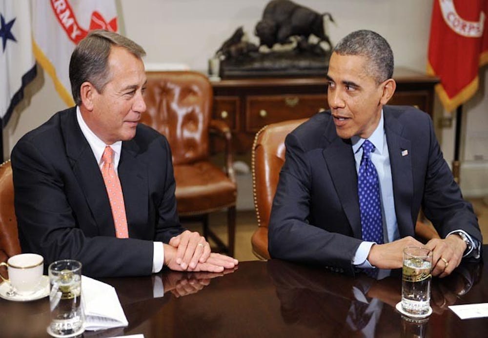U.S. President Barack Obama speaks with House Speaker John Boehner during a meeting with a bipartisan group of congressional leaders in the Roosevelt Room of the White House on November 16, 2012 in Washington, DC. (Olivier Douliery/Abaca Press/MCT)