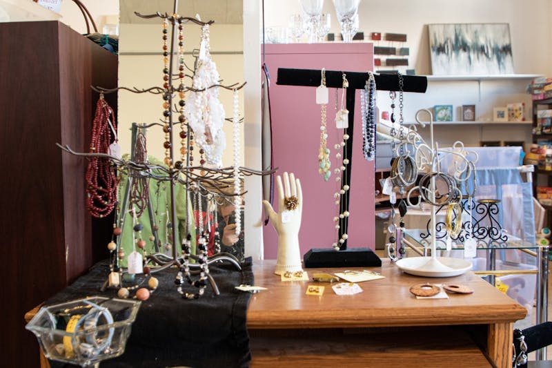 Earrings, necklaces, and bracelets hang near the entrance of the Muncie YWCA's Twice as Nice resale shop Feb. 25. Gena Coers, a volunteer and Tri Kappa member, said that jewelry is one of their most popular items. Alex Bracken, DN