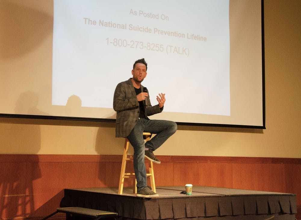 Josh Rivedal recounts his past Nov. 28, 2018, in the Student Center Ballroom. Rivedal offered advice about staying aware of those around us and the importance of mental health in his program “The i’Mpossible Project” hosted by SGA and Greek Life. Pauleina Brunnemer,DN.