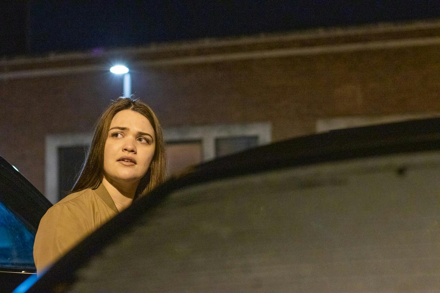 Rhyan Radabaugh gets out of her car Jan. 14, 2020. "Always park under a streetlight," Radabaugh said. Jacob Musselman, DN Illustration