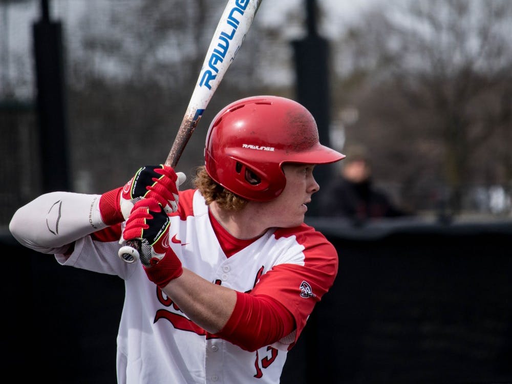 Redshirt junior Griffin Hulecki bats on March 16 in the Cardinals’ home game against Dayton at First Merchants Ballpark Complex. Hulecki had 1 RBI during the game. Rebecca Slezak, DN