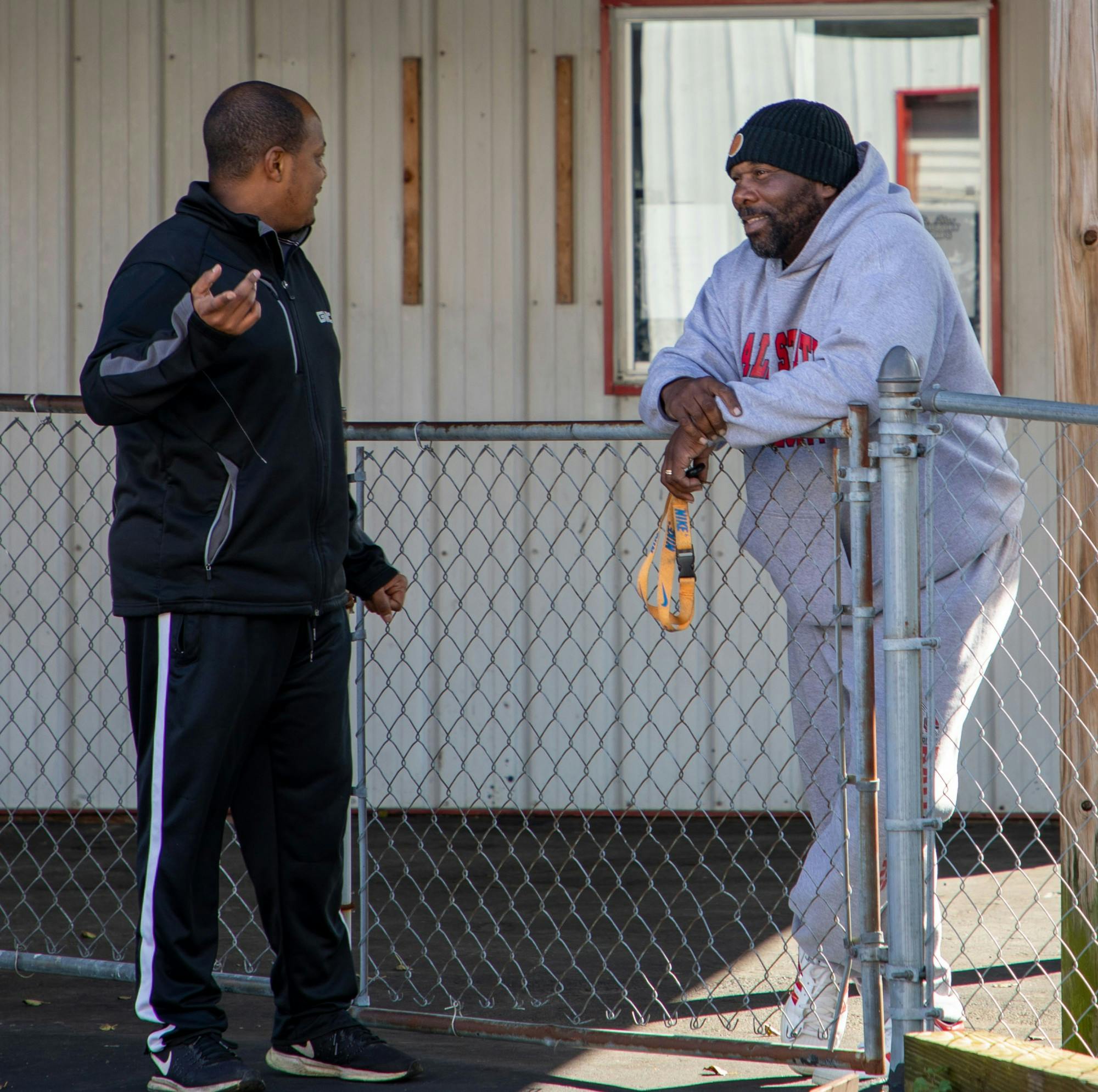 Charles Venable (left) and customer (right) talk about Victory Laps Oct. 31. Customers are able to contact Venable through Facebook, Instagram, Twitter, or phone number. Tori Smith, DN